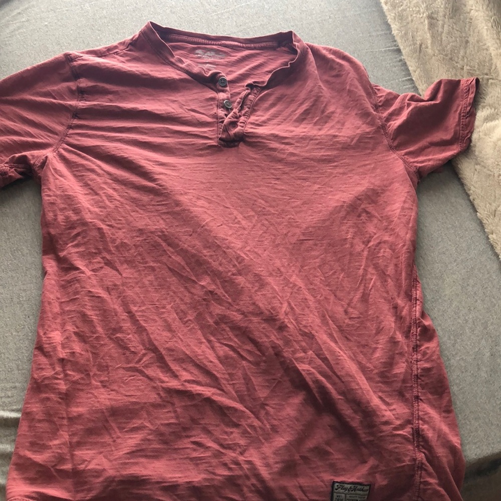 Cute button up T-Shirt!! Lmk if your interested size L